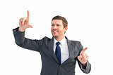 Happy businessman pointing with fingers