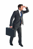 Businessman looking with his briefcase