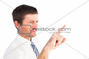 Businessman pointing with his finger