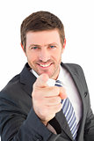 Businessman smiling and pointing