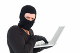 Hacker using laptop to steal identity