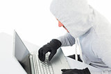 Hacker using laptop to steal identity