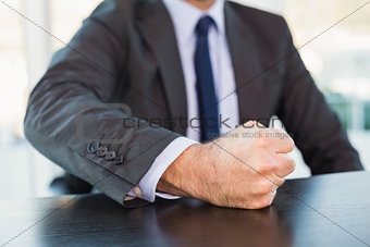 Angry businessman thump the table
