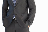 Businessman standing with hand in pocket