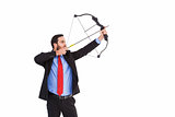 Focused businessman shooting a bow and arrow