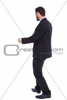 Handsome businessman in suit standing