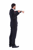 Handsome businessman pointing at something