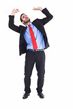 Worried businessman standing and pushing up