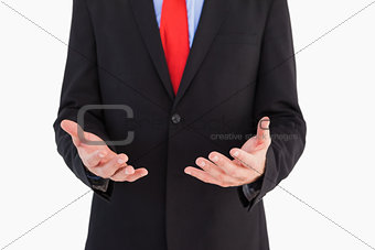 Businessman presenting with his hands