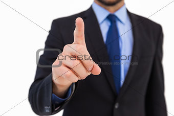 Businessman pointing his finger at camera
