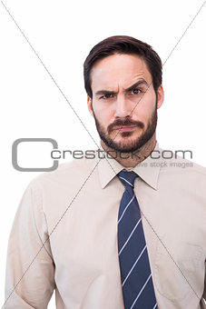 Portrait of a doubtful young businessman