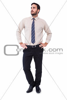 Businessman standing with hands on hips