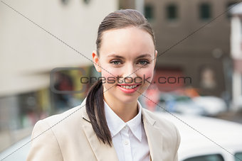 Young businesswoman smiling at camera
