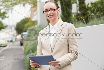 Young businesswoman using tablet pc