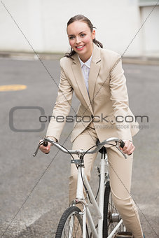 Young businesswoman riding her