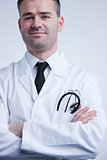 self confident available doctor in white coat