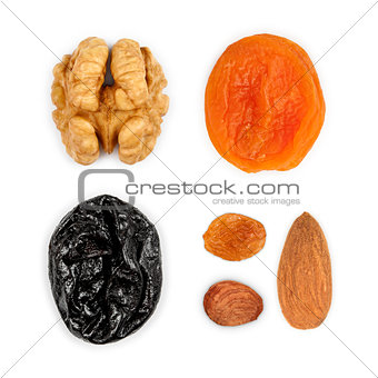 Collection of dried fruits: walnuts, dried apricots, prunes, rai