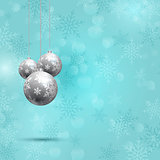 Christmas baubles on snowflake background 