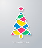 Greeting card with paper cut Christmas tree.