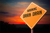 Brain Drain on Warning Road Sign.