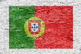 Flag of Portugal painted on brick wall