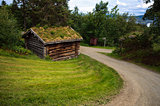 Countryside landscape with ancient old historic wooden house in Norway