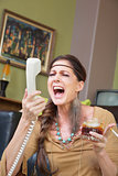 Woman Drinking and Singing at Phone