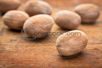 pecan nuts on grunge wood