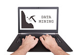 Man working on laptop, data mining