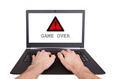 Man working on laptop, game over