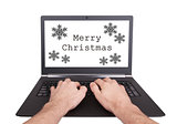 Man working on laptop, merry christmas