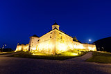 Old fortress "Cetatuia" illuminated at night, Brasov