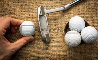 Putter and golfballs