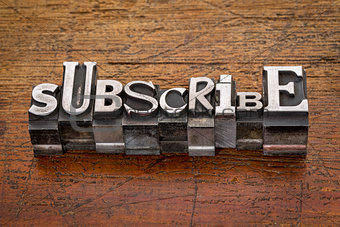 subscribe word  in metal type
