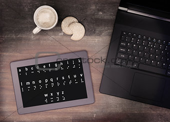 Braille on a tablet, concept of impossibility