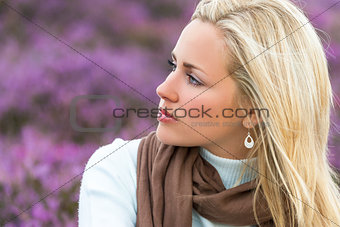 Young Woman Girl in Field of Purple Heather Flowers