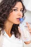 Woman Drinking Bottle of Water