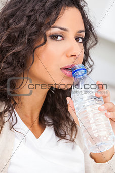 Woman Drinking Bottle of Water