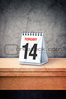 Valentine day concept. February 14th on desk calendar at office 