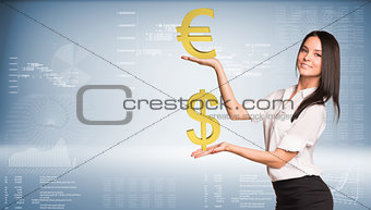 Smiling businesswoman holding dollar and euro signs. Blue gradient background