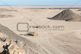 Rocky desert landscape with mountains