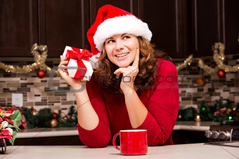 woman holding Christmas present