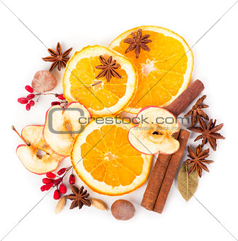 Christmas spices and dried orange sliceson