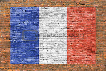 Flag of France painted over brick wall