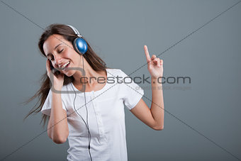 woman with headphones listening to music