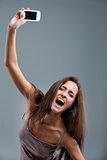 woman throwing a mobile phone