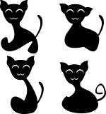 Set of four funny smiling silhouetted cats