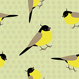 Seamless pattern with adorable yellow birds on a polkadot background