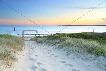 Sandy path to Greenhills Beach at dusk sundown