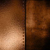Gold metal plate on grunge background